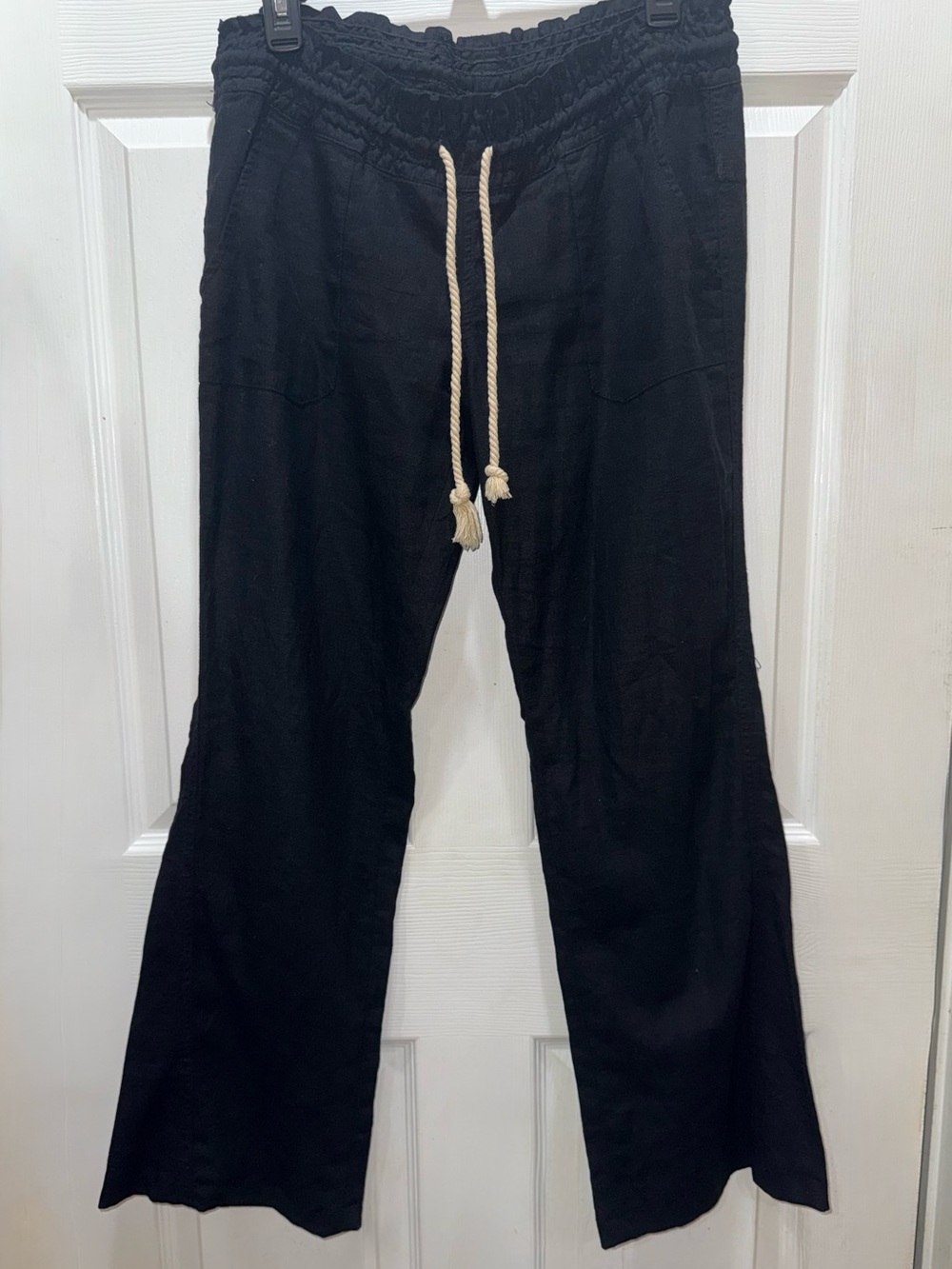 Black Roxy linen pants with drawstring waist, size L